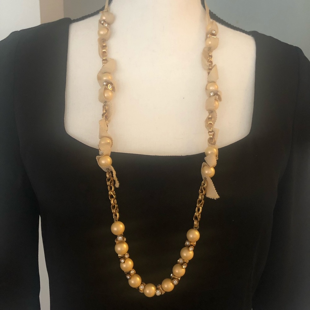 Modern “Chanelisms”. Pearls, diamanté and ribbon